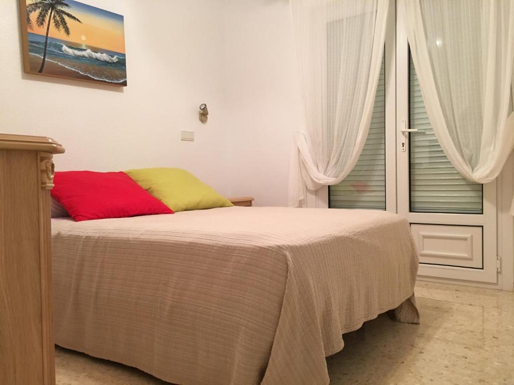 Postel nebo postele na pokoji v ubytování Frente al Mar - Rosales