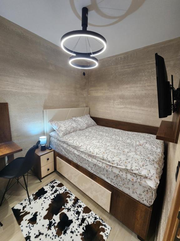 Postel nebo postele na pokoji v ubytování Ebra 76 Kraljevi Cardaci Kopaonik