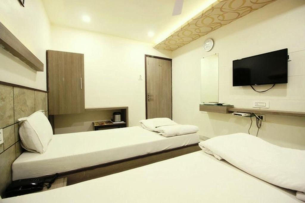 TV a/nebo společenská místnost v ubytování Hotel City Inn