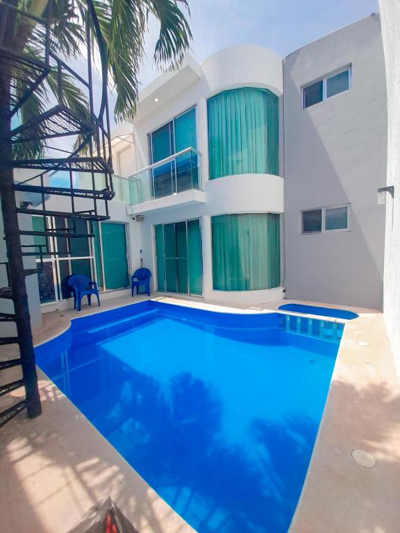 Bazén v ubytování Casa con alberca en el centro de Puerto Progreso nebo v jeho okolí