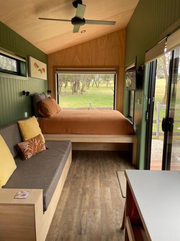 Postel nebo postele na pokoji v ubytování Marlo Hideaway