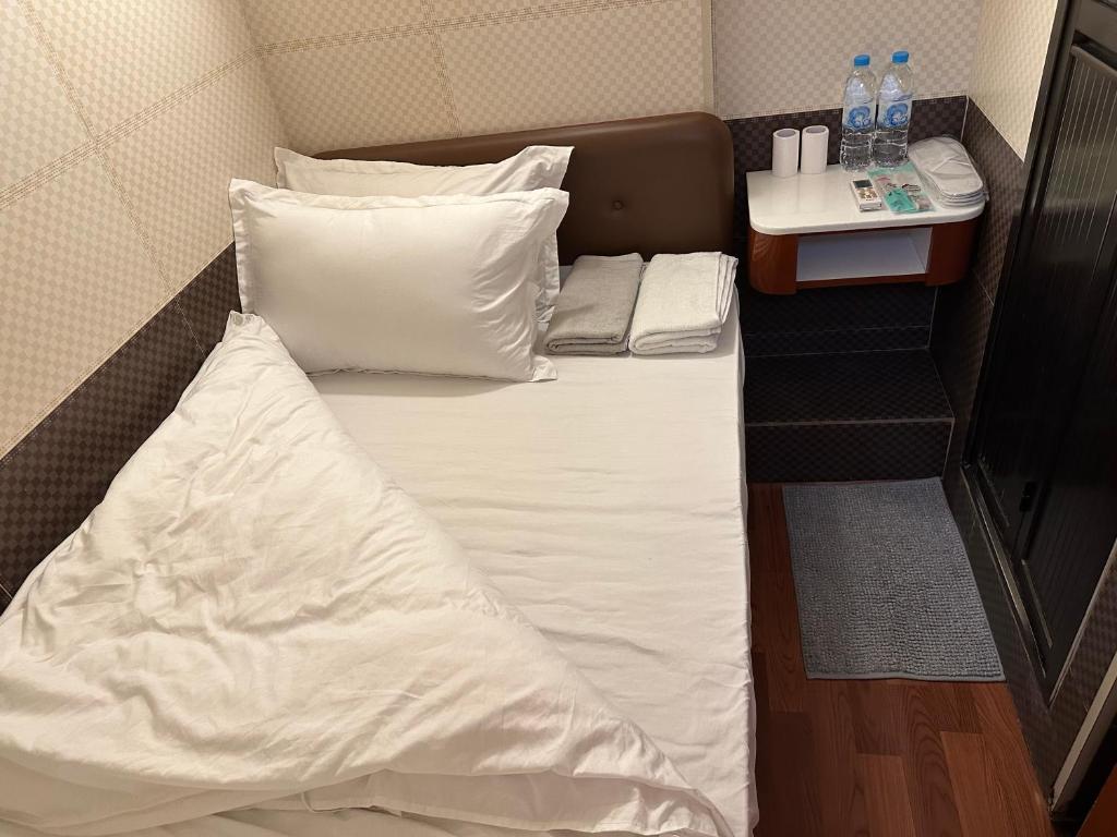 Postel nebo postele na pokoji v ubytování Piaget guest house