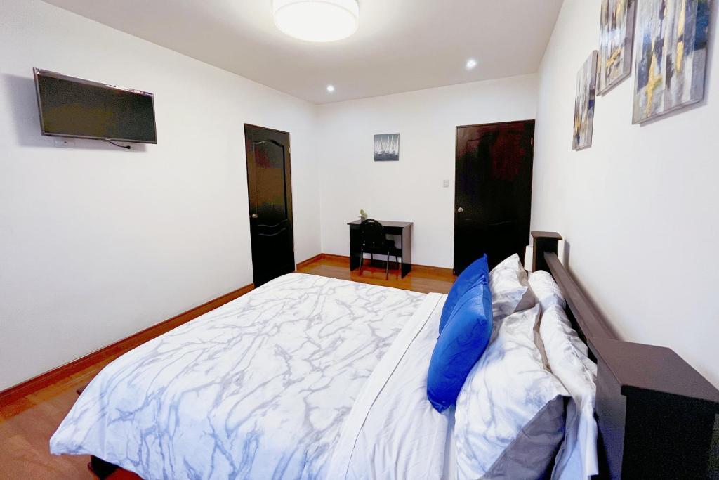 Postel nebo postele na pokoji v ubytování Viva Guest House