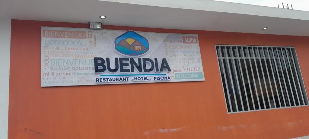 a sign on the side of a building at BUENDIA HOTEL in Pueblo Viejo