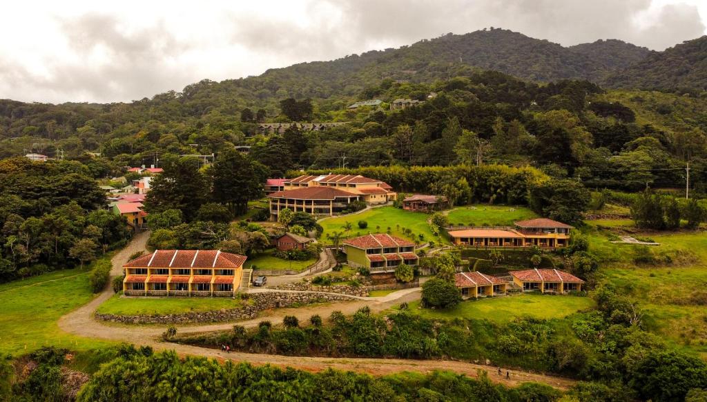 an aerial view of a house on a hill at Hotel Montaña Monteverde in Monteverde Costa Rica
