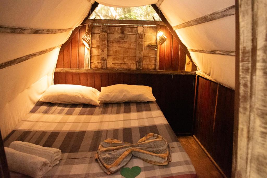Postel nebo postele na pokoji v ubytování Lagarto Na Banana Hostel