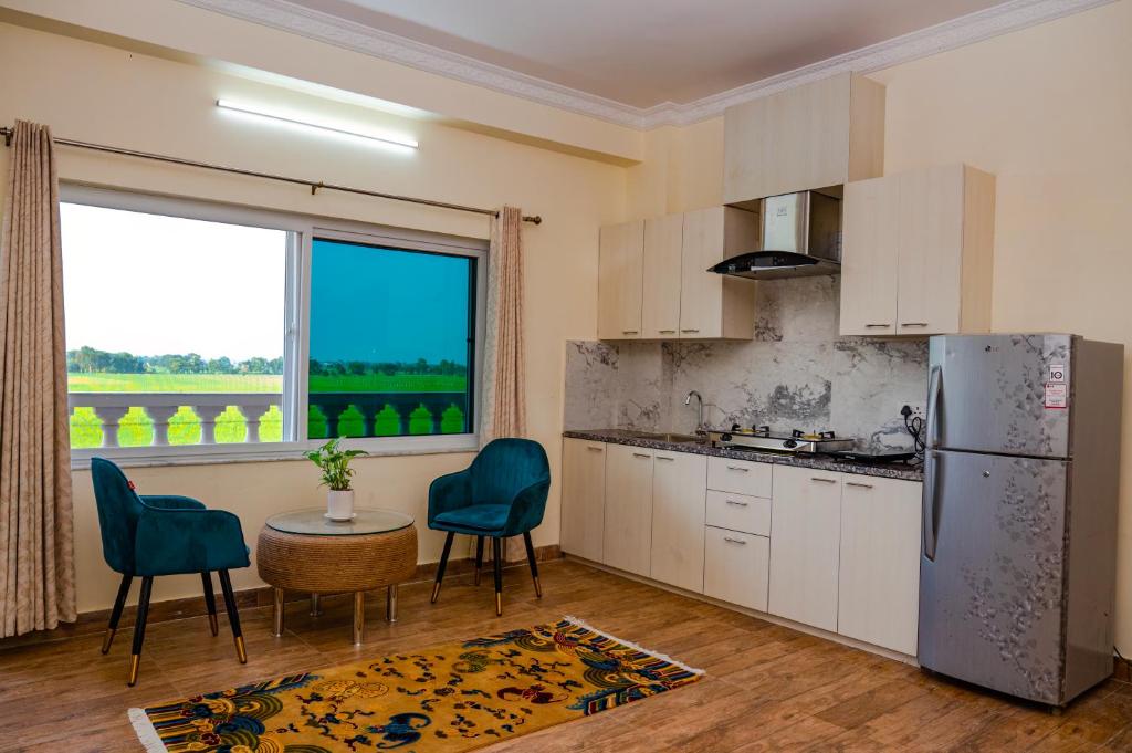 Cucina o angolo cottura di Lumbini Five Elements Hotel