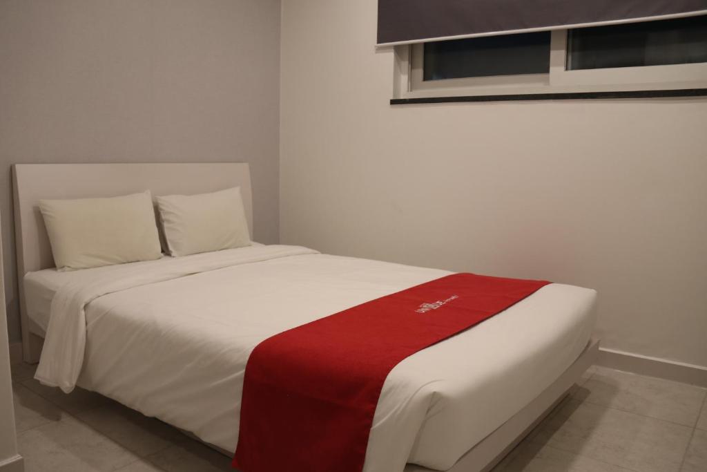 Postel nebo postele na pokoji v ubytování Jn Park Hotel Dongdaemun