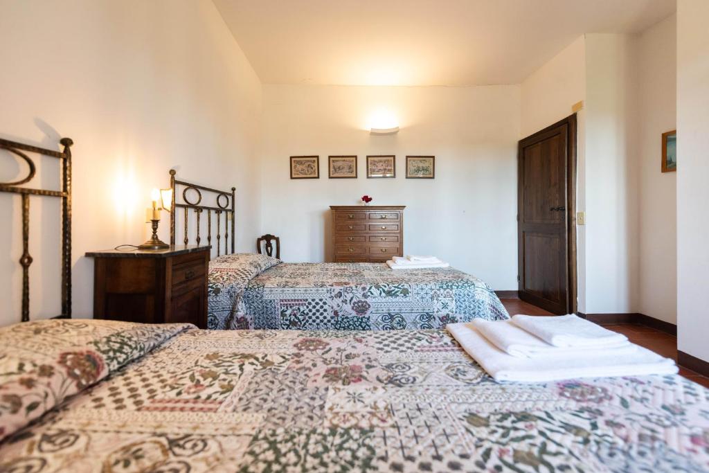 Postel nebo postele na pokoji v ubytování Villa Cucule