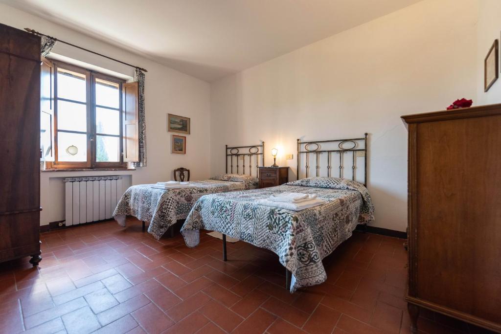 Postel nebo postele na pokoji v ubytování Villa Cucule