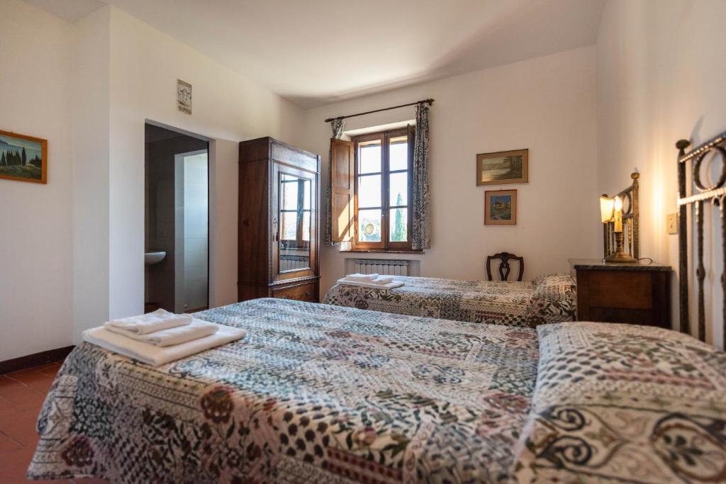Postel nebo postele na pokoji v ubytování Villa Cucule