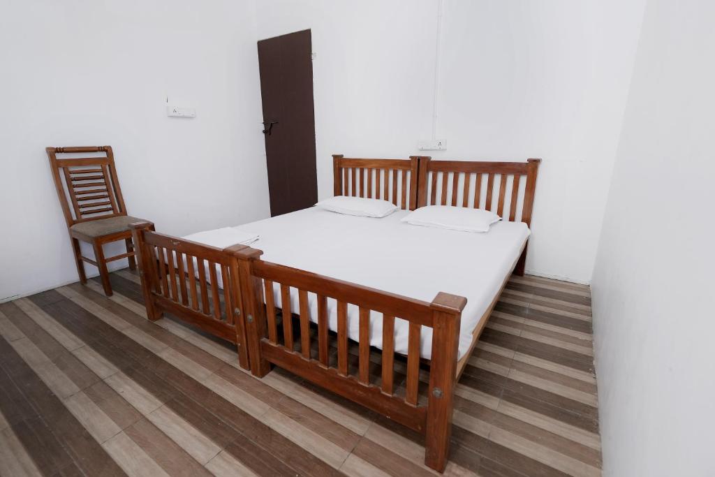 Postel nebo postele na pokoji v ubytování Metropolitan Serviced Villa