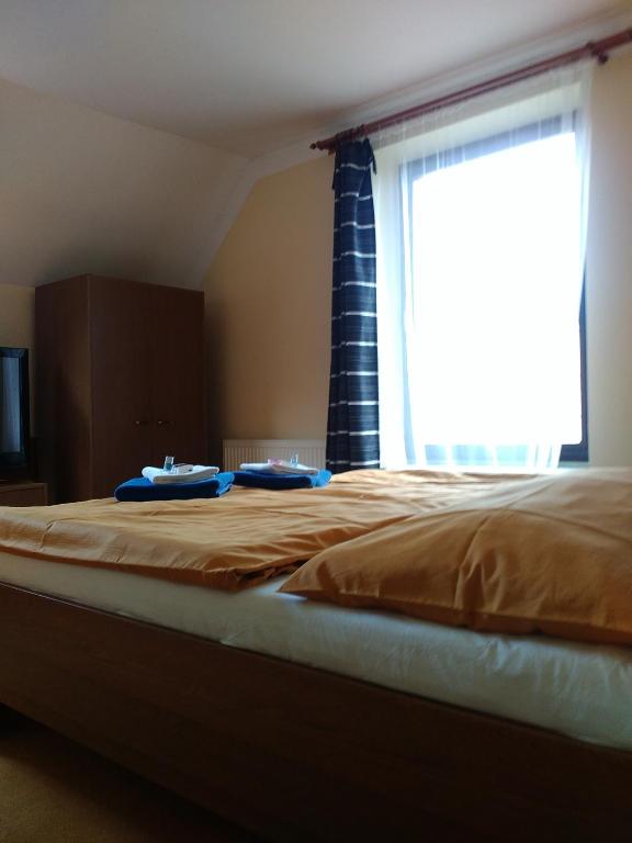 Postel nebo postele na pokoji v ubytování Penzion Eden Turnov