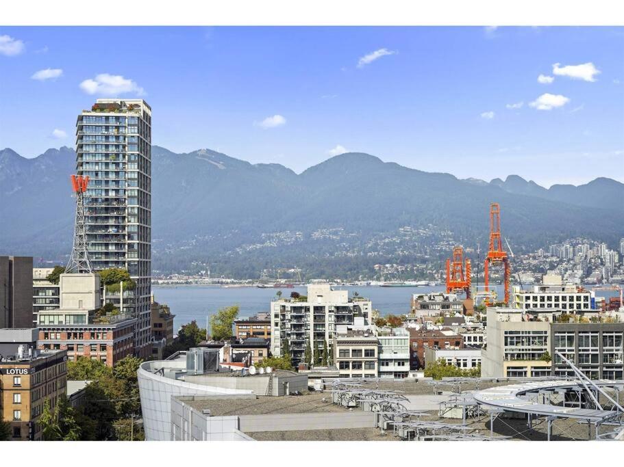Two Bed Condo with Pool steps from Rogers Arena, Vancouver (updated