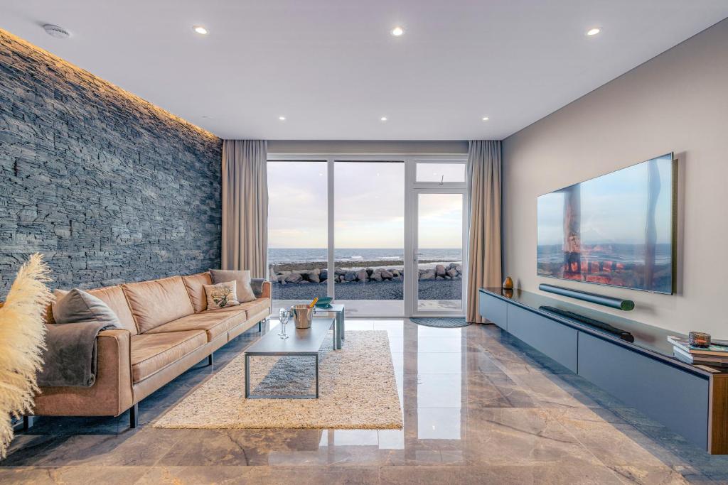 TV a/nebo společenská místnost v ubytování Bay View Apartments