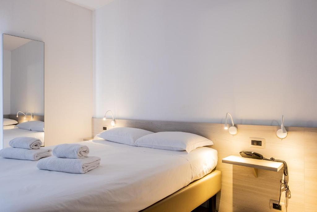 Postel nebo postele na pokoji v ubytování B&B Hotel Roy