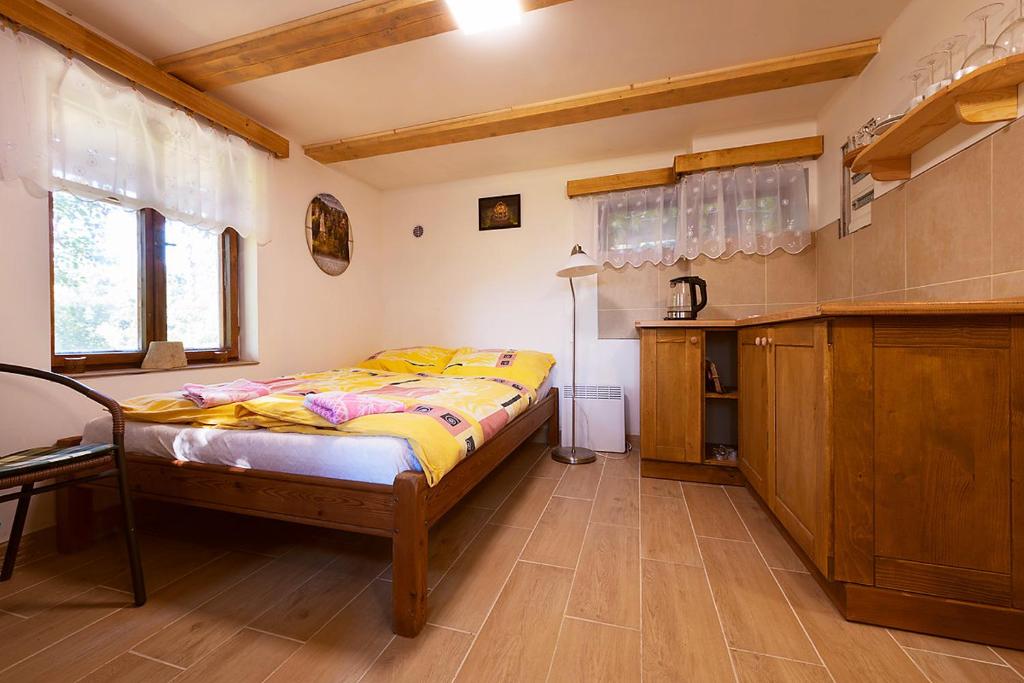 Postel nebo postele na pokoji v ubytování Miniresort AMULET