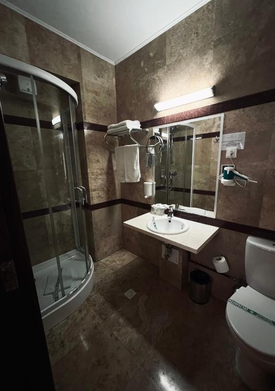 Koupelna v ubytování Hotel Royale