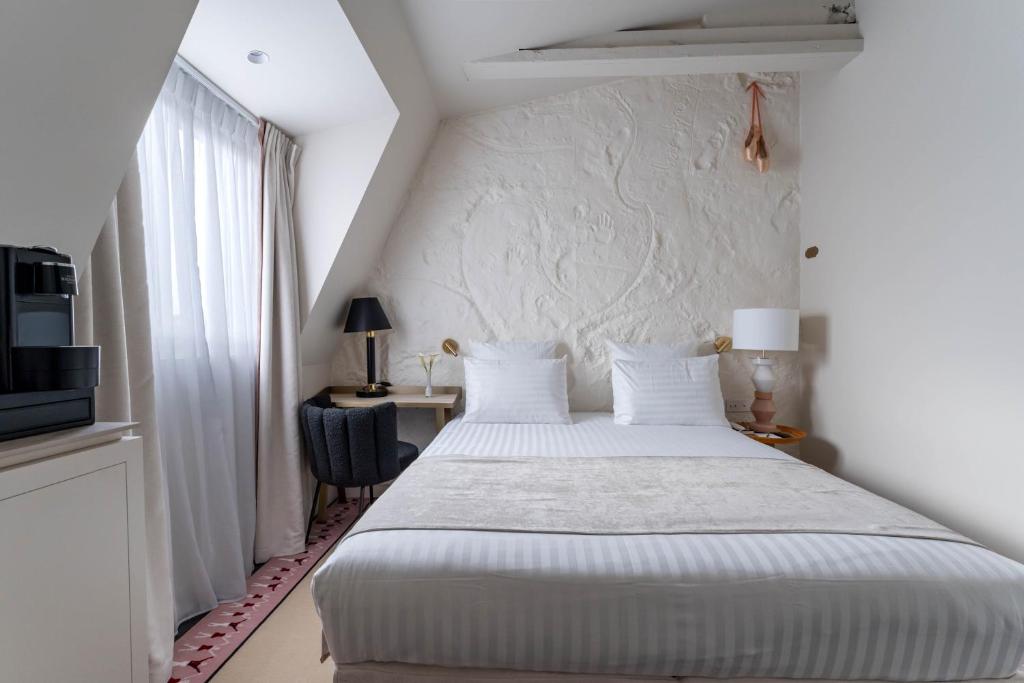 Postel nebo postele na pokoji v ubytování Hotel Astra Opera - Astotel