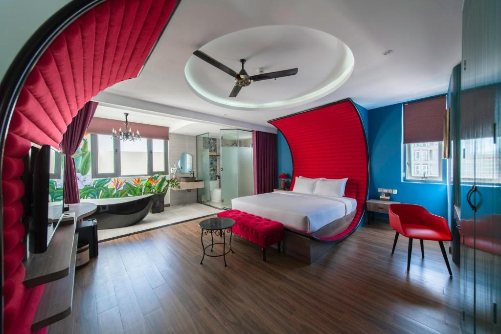 Postel nebo postele na pokoji v ubytování Aaron Boutique Hotel