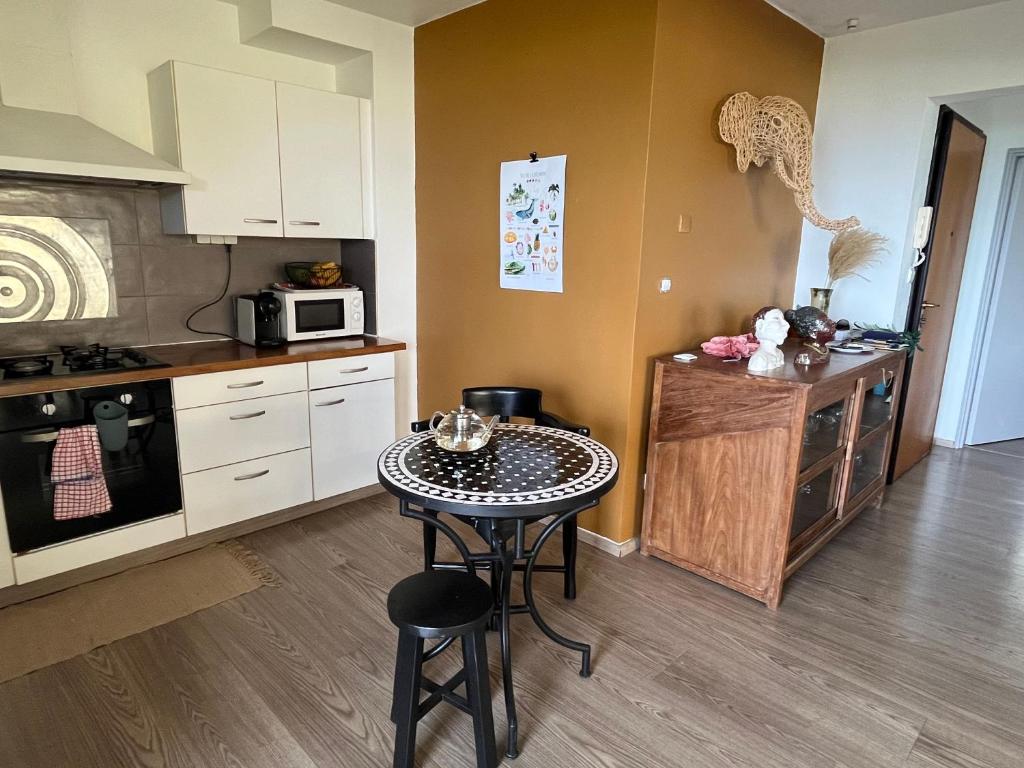 Kuhinja oz. manjša kuhinja v nastanitvi Aprile des îles .Appartement avec une jolie vue