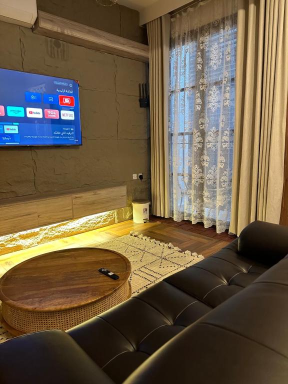 TV a/nebo společenská místnost v ubytování Dar Sayang