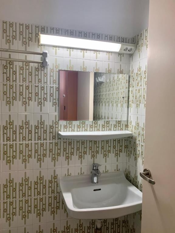 Koupelna v ubytování Hotel Cosmos