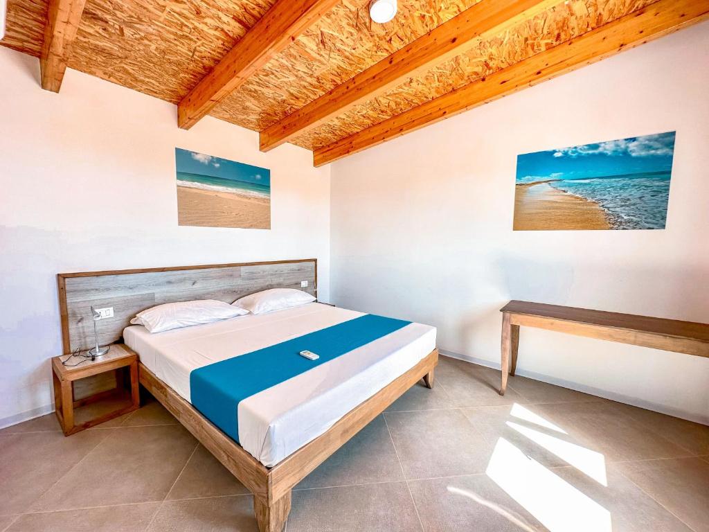Postel nebo postele na pokoji v ubytování Halos Casa Resort