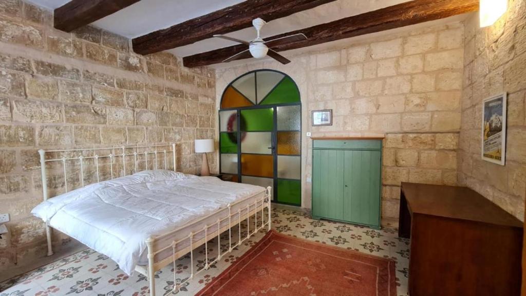 Postel nebo postele na pokoji v ubytování Mulberry Suites