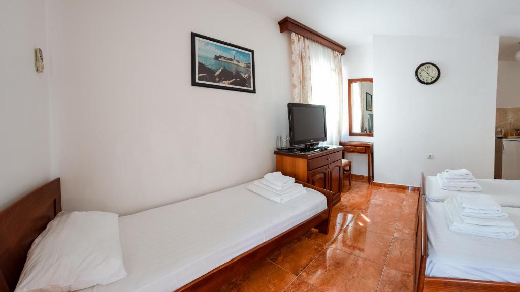 Postel nebo postele na pokoji v ubytování Villa MD