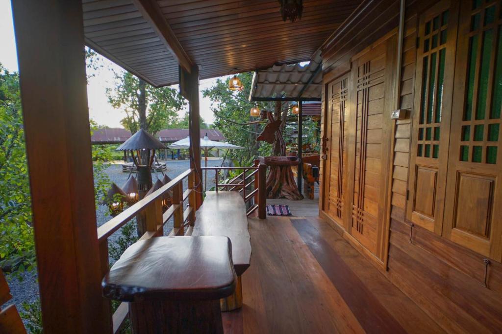 Balkón nebo terasa v ubytování Suk Sabai Homestay