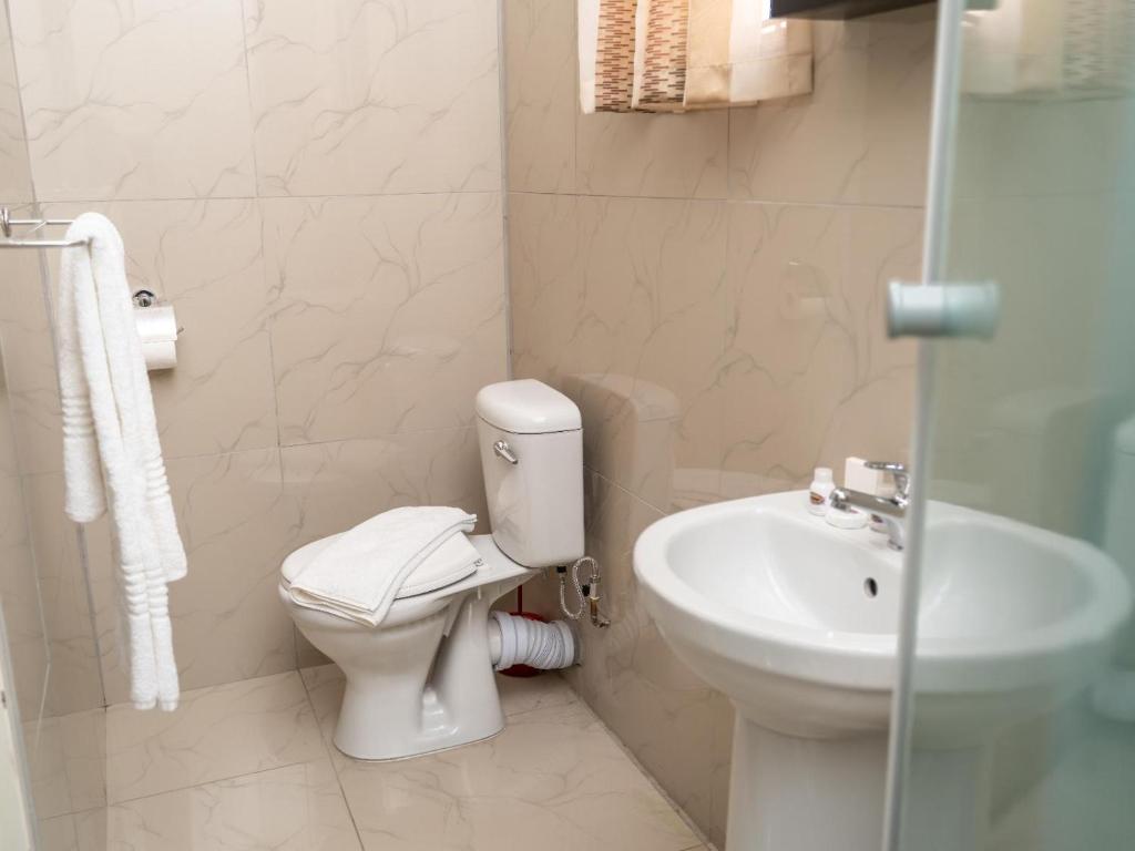 Koupelna v ubytování Ngwenya City Hotel