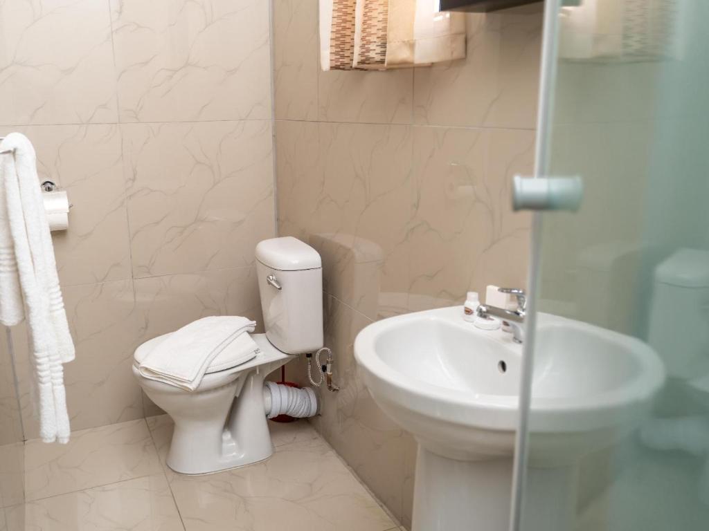 Koupelna v ubytování Ngwenya City Hotel