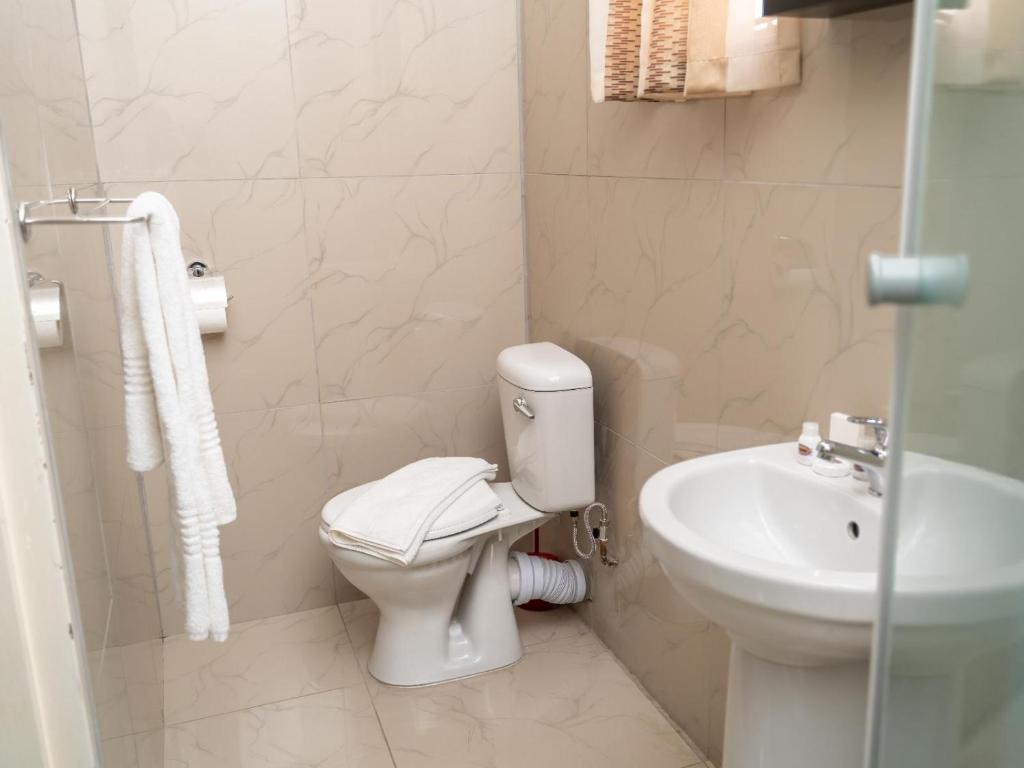 Koupelna v ubytování Ngwenya City Hotel