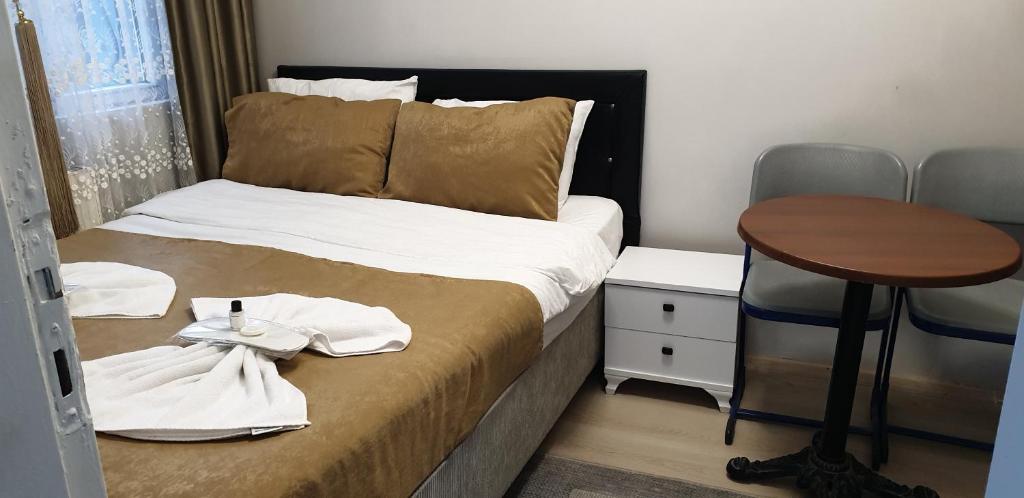 Postel nebo postele na pokoji v ubytování Taksim Millennium Suit Hotel