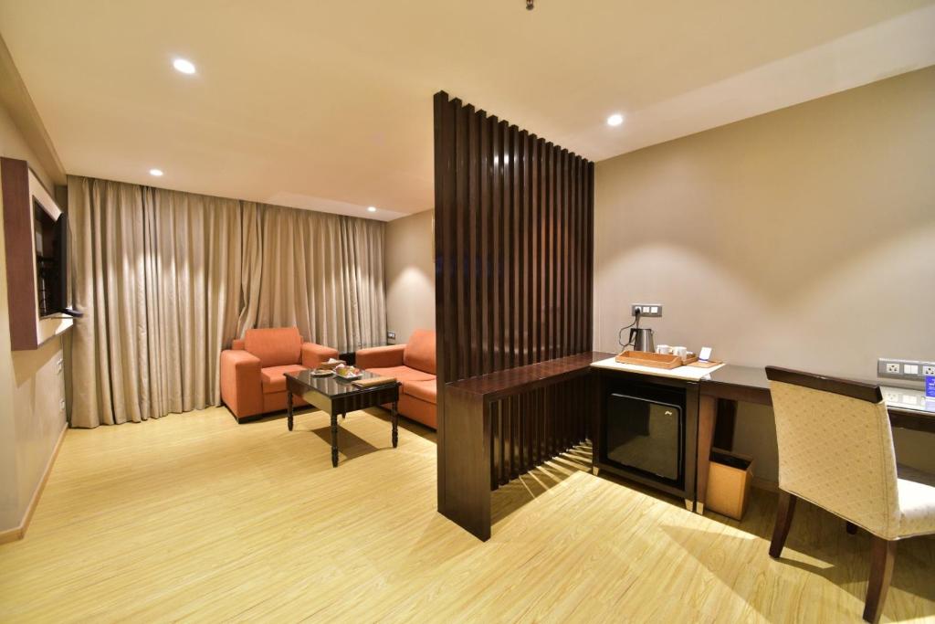 Posezení v ubytování Citadel Sarovar Portico Bengaluru