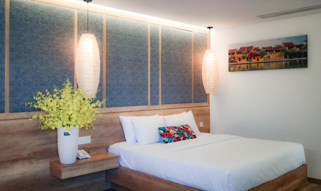Postel nebo postele na pokoji v ubytování K House Apartment Danang Beach