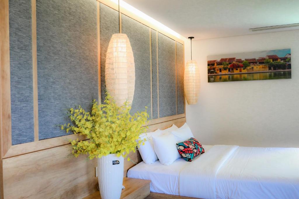 Postel nebo postele na pokoji v ubytování K House Apartment Danang Beach