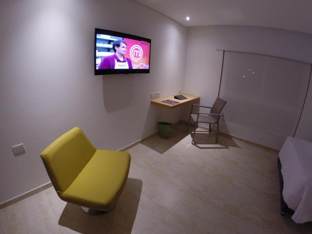 TV a/nebo společenská místnost v ubytování Del Mar Hotel