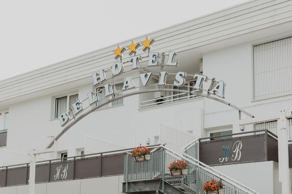 a sign on the side of a building at Hotel Bellavista in Grado