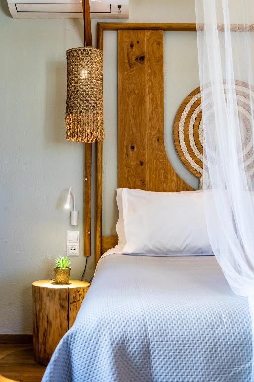 Postel nebo postele na pokoji v ubytování Villa Nektaria