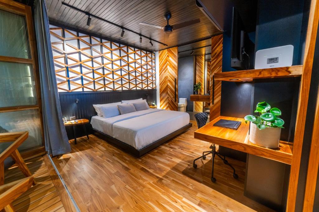 Postel nebo postele na pokoji v ubytování Danta Santa Lofts