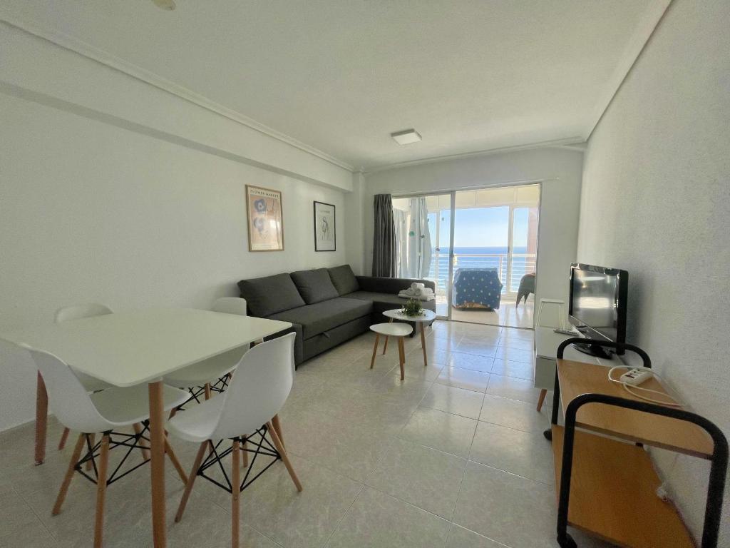 A television and/or entertainment centre at Caballos Apartment
