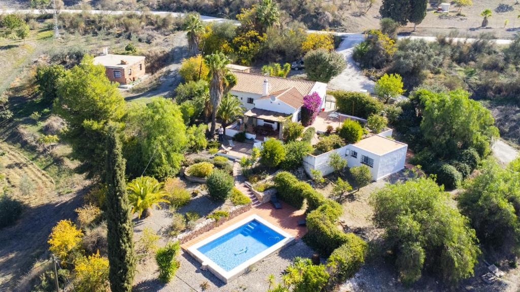 an aerial view of a house with a swimming pool at Cubo's La Maison de Mily in Villafranco de Guadalhorce