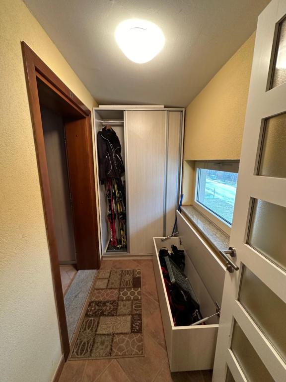 a room with an open door to a closet at Bjelasnica Apartment with the most beautiful view in Bjelašnica