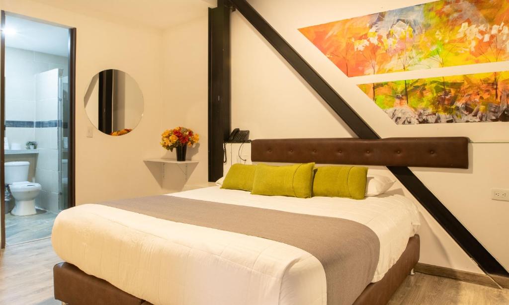 Postel nebo postele na pokoji v ubytování Hotel Wess