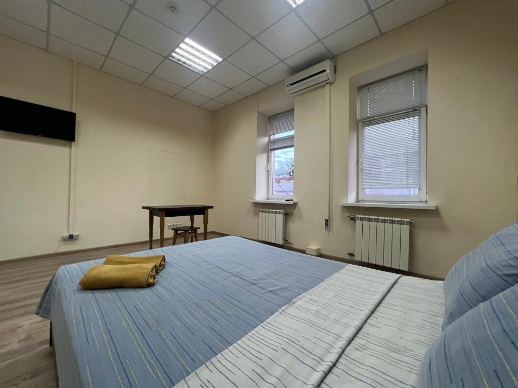 Postel nebo postele na pokoji v ubytování Міні-готель "Старовокзальний"