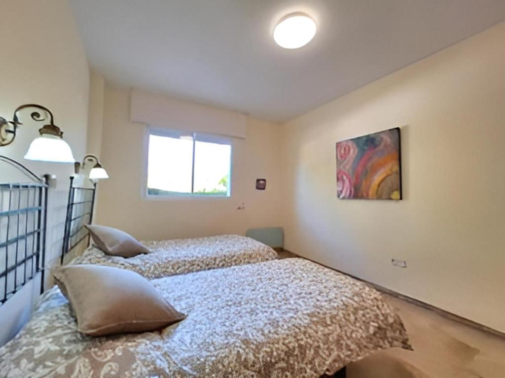 Posteľ alebo postele v izbe v ubytovaní Gorgeous 2BR Apt. w/ Mountain View Puerto Banus