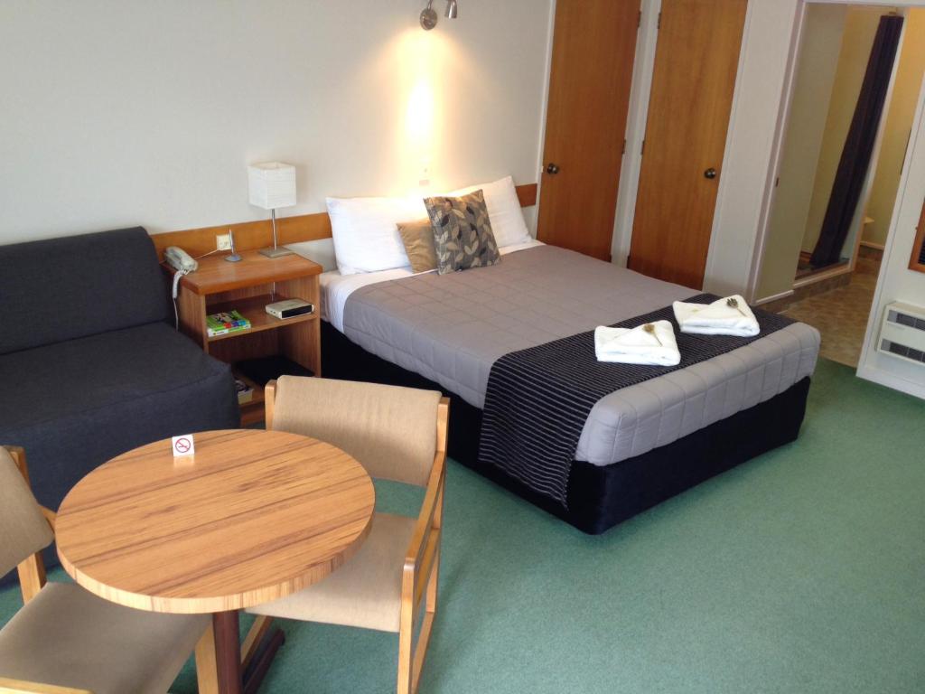 Postel nebo postele na pokoji v ubytování Aalton Motel