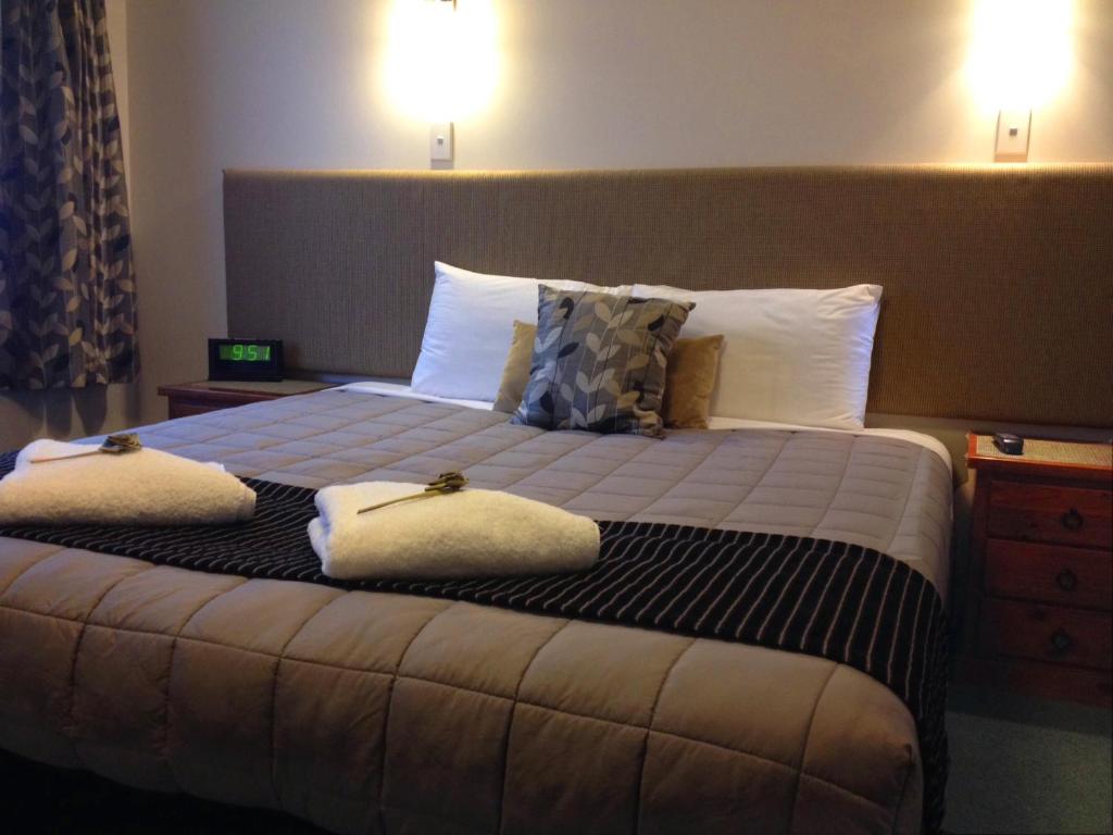 Postel nebo postele na pokoji v ubytování Aalton Motel